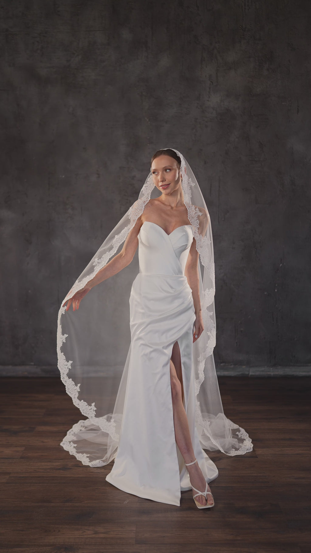 Spanish mantilla wedding veil with floral lace edge and soft bridal tulle.
